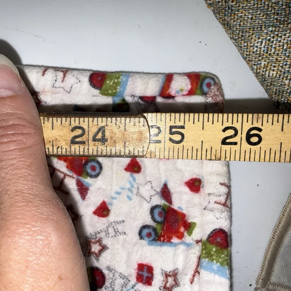 Vtg Baby Quilt Of Trains Print bordered by blue sashing and red cornerstones